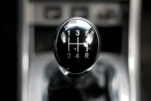 A close-up view of a stick shift in a car.