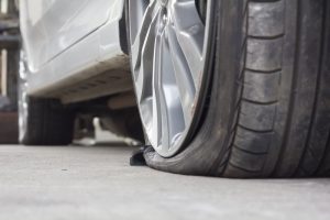 A close-up view of a flat tire. 