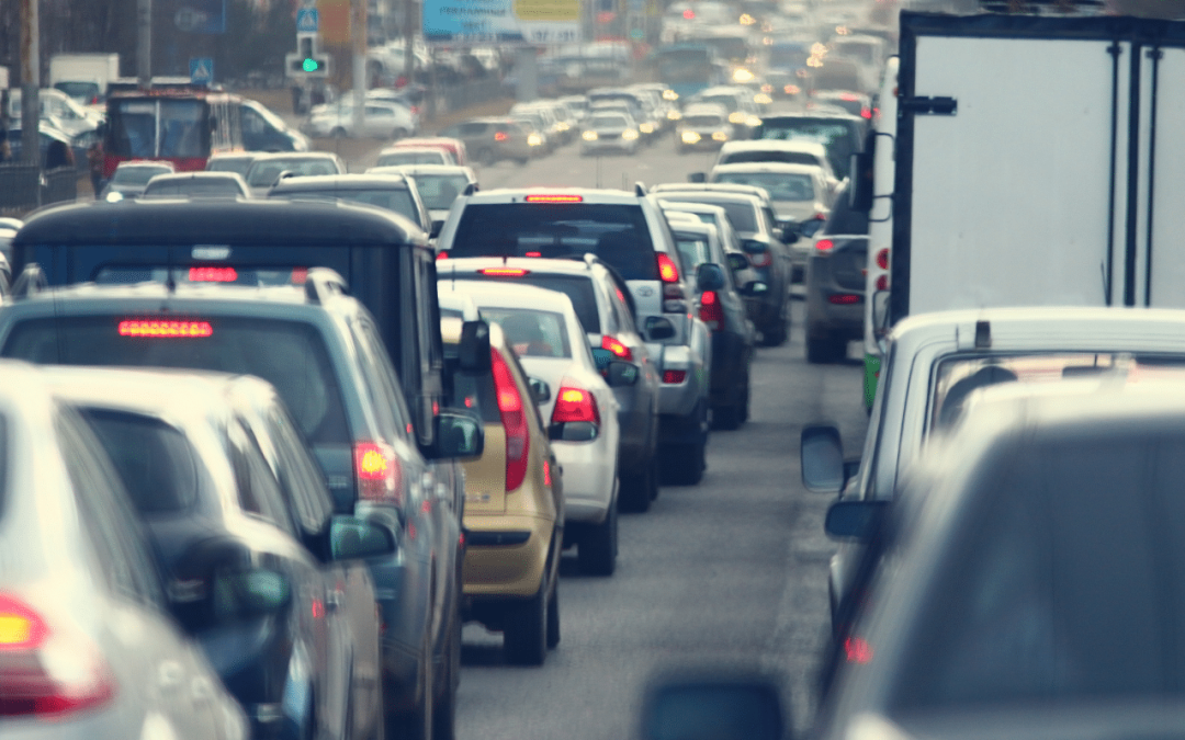 Heavy bumper-to-bumper rush hour traffic on a busy city highway highlighting the need for brake and transmission maintenance at Scott's Fort Collins Auto.