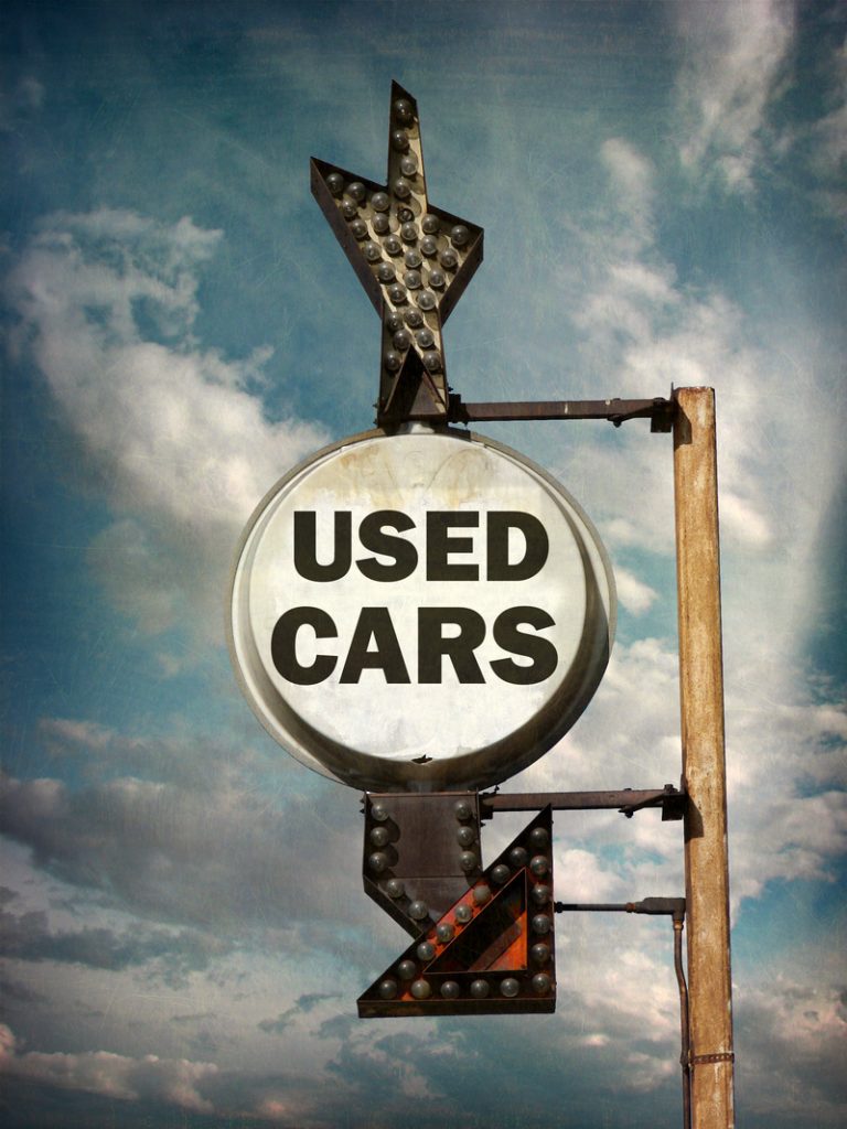Sign that is worn and says 