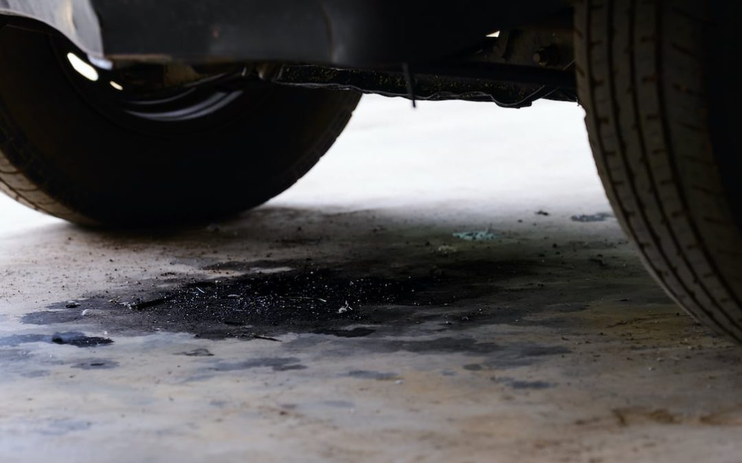 Oil leakage from old car.