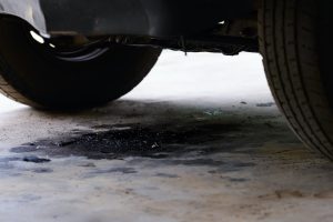 Oil leakage from old car.
