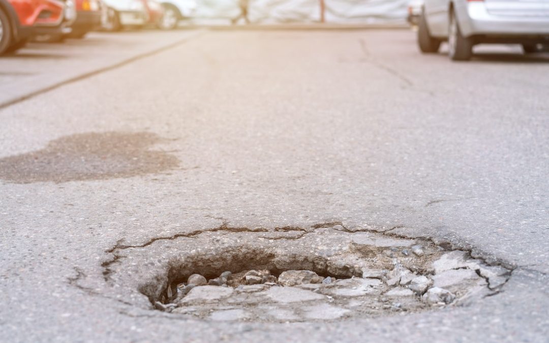 Avoid potholes on the road for car safety