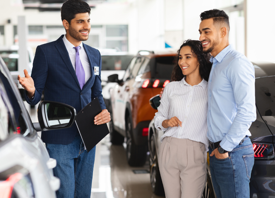Couple shopping for a brand new car