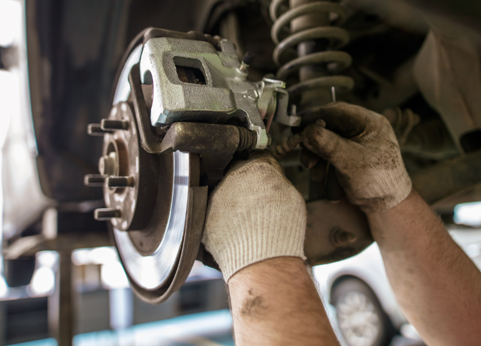Brakes being repaired on a car