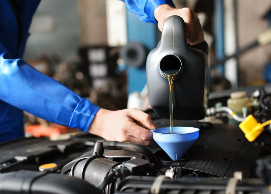 Car oil being changed
