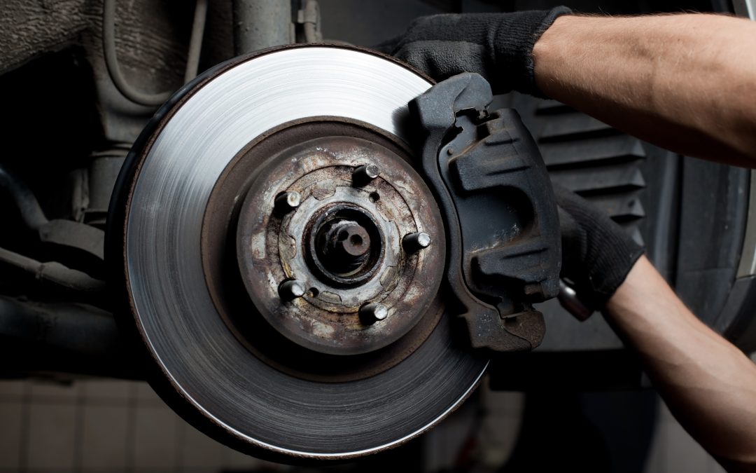 Car mechanic repair brake pads